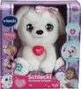 A plush toy dog in its packaging, with promotional text and images. Podgląd zdjęcia produktu