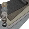 A collage of different carpet textures and colors, with a main image showing several carpet rolls in different shades. Produktbild-Vorschau