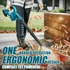 A person is using a cordless leaf blower to clear leaves from a paved area next to a wooden planter. Produktbild-Vorschau