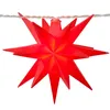 A close-up of a red star-shaped LED light on a string. Produktbild-Vorschau