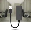 A product shot of a USB to Ethernet adapter. Voir les images du produit