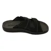 A single black sandal is shown from the side against a white background. Anteprima dell’immagine prodotto