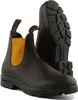 A pair of brown leather Chelsea boots with mustard yellow elastic inserts, shown against a white background. Voir les images du produit
