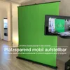A green screen setup with a camera screen showing the green screen. Anteprima dell’immagine prodotto