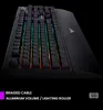 A close-up, angled view of a black gaming keyboard with RGB lighting, set against a black background. Text overlays describe features. Produktbild-Vorschau