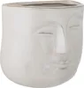 A white ceramic planter shaped like a face. Produktbild-Vorschau
