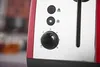 A close-up shot of the control panel of a red toaster. Náhľad obrázku produktu