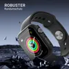 A smartwatch with a protective case is shown in a dramatic, rocky environment, with fragments of rock flying around it. Produktbild-Vorschau