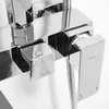 A close-up view of a modern chrome shower faucet with two control knobs and a handle. Náhľad obrázku produktu