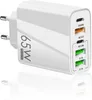 A white 65W USB charger with multiple ports, shown at an angle on a white background. Produktbild-Vorschau
