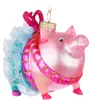 A glass Christmas ornament shaped like a pink pig wearing a blue tutu and a pink ribbon. Podgląd zdjęcia produktu