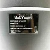 A close-up of a label on a black portable speaker. Produktbild-Vorschau