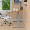 An office desk with a chair and a computer. Produktbild-Vorschau