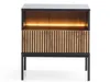 A modern nightstand with a slatted drawer front and integrated LED lighting. Produktbild-Vorschau