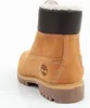 A close-up, rear view of a tan Timberland boot with a black cuff and white lining. Produktbild-Vorschau