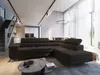 A modern living room with a large sectional sofa, coffee table, and dining area visible in the background. Produktbild-Vorschau