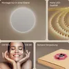 A collage of images showcasing a round illuminated mirror, LED strips, a comparison of CRI values on a woman's face, and a packaged product with a fragile sticker. Produktbild-Vorschau
