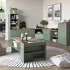 A living room scene featuring a modular green media unit and coffee table. Anteprima dell’immagine prodotto