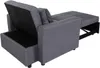 A dark gray sofa bed is shown from a rear-diagonal angle, with the storage compartment open and the bed extended. Produktbild-Vorschau