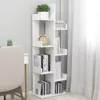 A white bookshelf with books and a plant. Anteprima dell’immagine prodotto