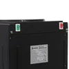 A close-up view of the top section of a black water dispenser, showing two switches and a label with technical information. Náhled obrázku produktu
