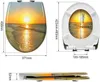 Diagrams and measurements of a toilet seat with a sunset beach motif. Produktbild-Vorschau
