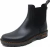 A black rubber boot on a white background. Produktbild-Vorschau