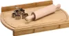 A wooden cutting board with a rolling pin and cookie cutters. Anteprima dell’immagine prodotto
