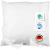 A white pillow with feathers and product tags. Produktbild-Vorschau