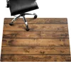 An office chair is partially visible on a wooden-patterned floor mat. Produktbild-Vorschau