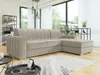 A modern living room with a sectional sofa, large windows, and decorative shelves. Náhľad obrázku produktu