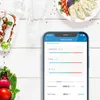 A flat lay of food and a smartphone displaying a nutrition analysis app. Náhľad obrázku produktu