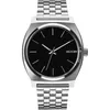 A close-up studio shot of a Nixon Time Teller watch with a black face and silver metal band. Produktbild-Vorschau