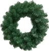 A green artificial Christmas wreath on a white background. Náhled obrázku produktu