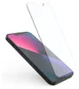 A screen protector is shown being placed on a smartphone. Podgląd zdjęcia produktu