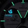 A close-up of a watch face with luminous markers and cartoon graphics. Produktbild-Vorschau