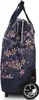 A side view of a floral patterned shopping trolley. Náhľad obrázku produktu