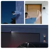 Collage of three images showing a security camera in different settings: mounted on a wall at night, a person receiving a package near a door with a camera, and a camera illuminating a driveway at night. Anteprima dell’immagine prodotto