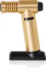 A gold and black flambé torch on a white background. Produktbild-Vorschau