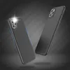 Two black phone cases are shown in a studio setting with dramatic lighting. Podgląd zdjęcia produktu