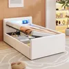 A modern white bed with storage and LED lighting. Produktbild-Vorschau