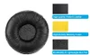 A close-up of a black headphone earpad with accompanying images and text describing its materials. Produktbild-Vorschau
