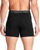 A person wearing black boxer shorts from the back. Náhľad obrázku produktu