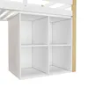 A close-up view of the storage unit of a bunk bed, showing four cubbies. Voir les images du produit
