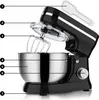 A black and silver stand mixer with its head tilted up, showing the whisk attachment and a clear splash guard. A white spatula is visible in the upper right corner. Produktbild-Vorschau