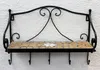 A black metal wall shelf with a mosaic tile surface and hooks underneath, mounted on a textured white wall. Podgląd zdjęcia produktu