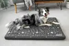A dog lying on a dog bed in a room. Náhľad obrázku produktu