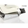 Close-up of a white racing seat with a silver base and a black gearshift holder attachment. Produktbild-Vorschau