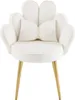A white accent chair with a bow-shaped pillow and gold legs, presented against a white background. Podgląd zdjęcia produktu