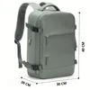 A green backpack with dimensions indicated by measurement lines and text. Podgląd zdjęcia produktu
